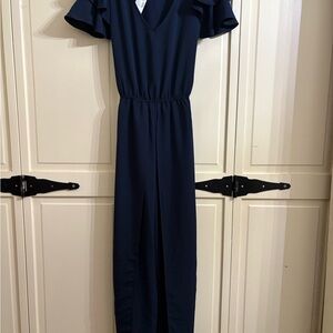 Maurices Navy Jumpsuit with Ruffle Sleeves